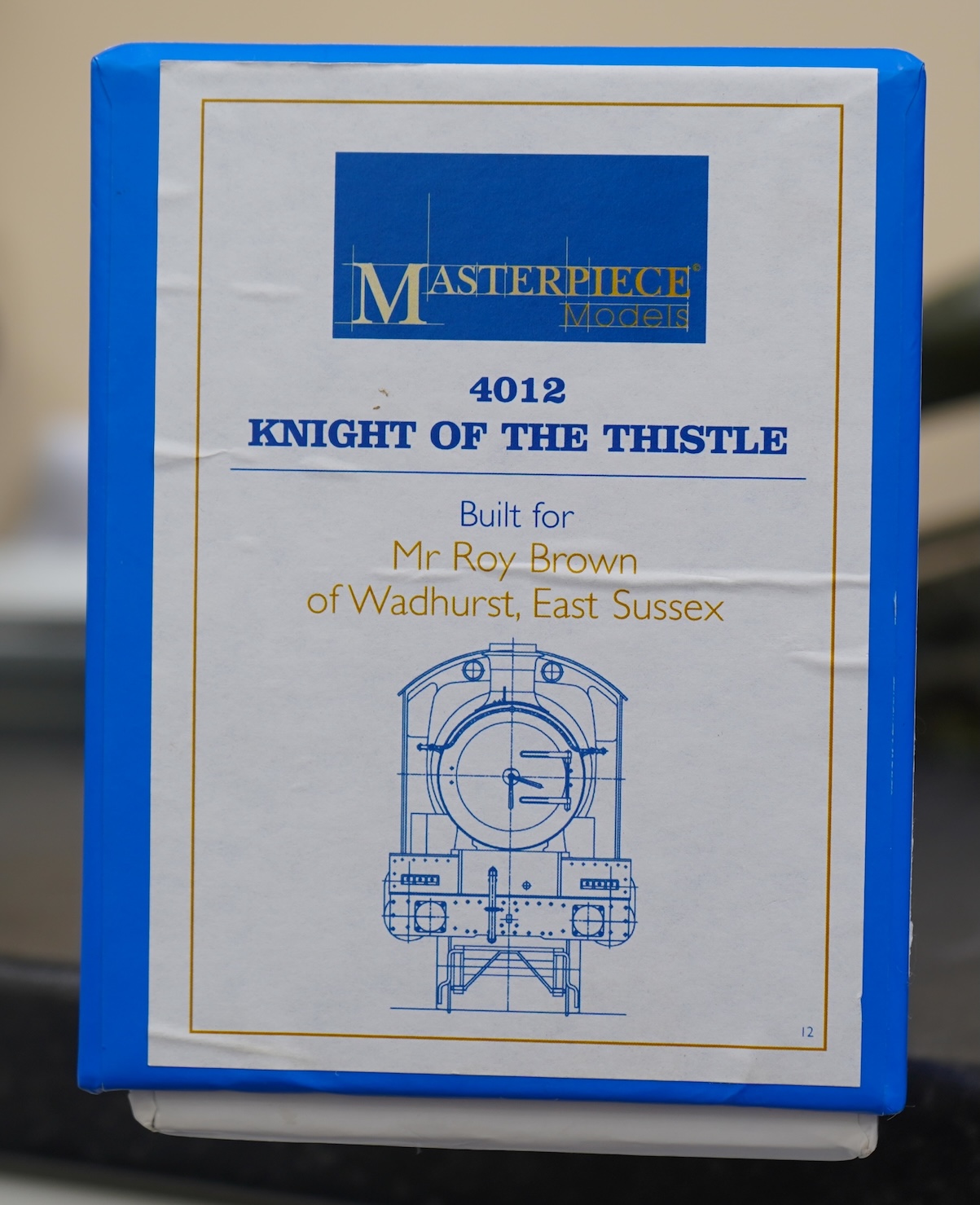 An 0 gauge Masterpiece Models model of GWR Star Class, Knight of the Thistle, 4012, 4-6-0 tender locomotive, powered for two rail operation, with original box, accessories, instruction booklet and other paperwork.